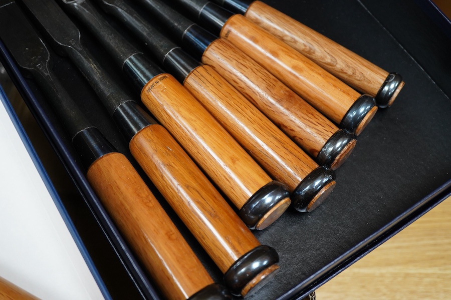 Four sets of Japanese chisels, including a set of six Kote Nomi cranked neck trowel chisels, a set of seven mortise chisels, and two other cabinetmakers sets (22 in total), plus two Japanese hammers/mallets